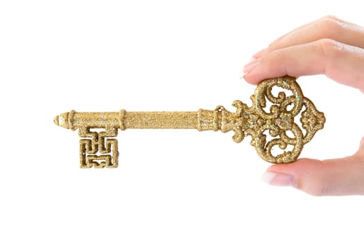Gold key in hand
