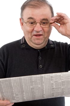 Senior reads newspaper