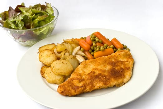 Breaded schnitzel with fried potatoes,s