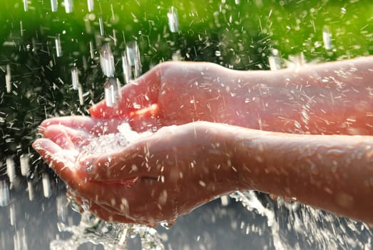 Hands and water