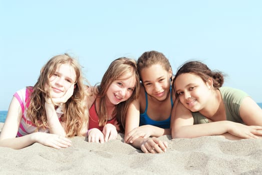 Four girls on a beach