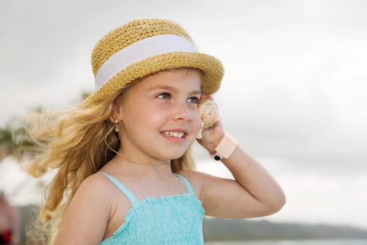 Girl with seashell