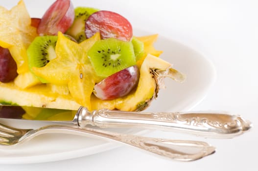 Fruit salad in pineapple quarter