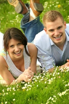 Happy couple on a meadow