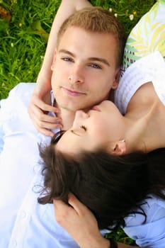 Happy couple on a meadow