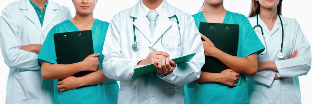 Confident medical staff team with doctor nurse and healthcare specialist professions people in hospital or clinic office. Medical and healthcare community in panoramic banner. Neoteric