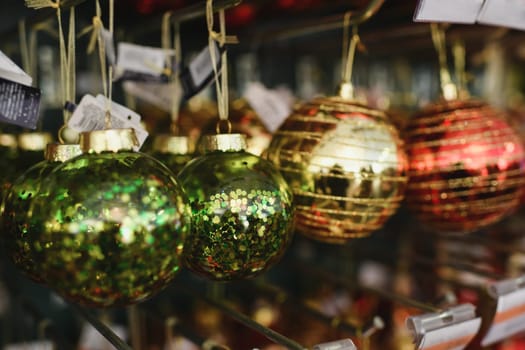 Red christmas decorations balls for the Christmas tree are sold in the store