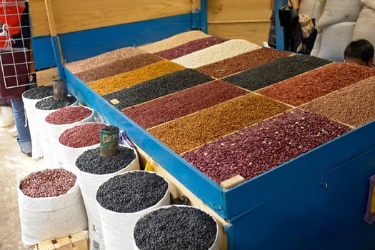 Market stall with spices and beans