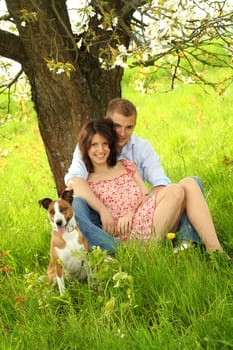 Happy couple with dog