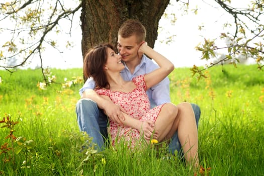 Happy couple on a meadow