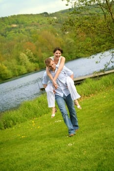 Happy couple on a meadow
