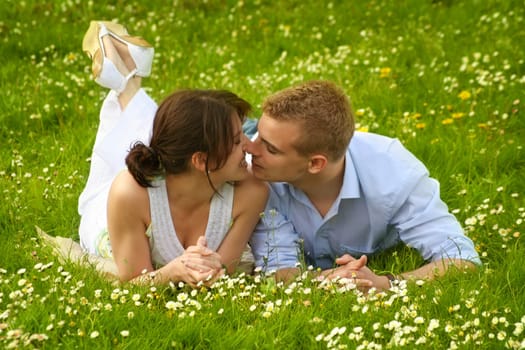 Happy couple on a meadow