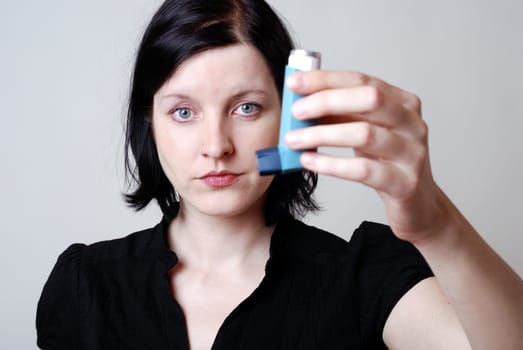 Woman with inhaler