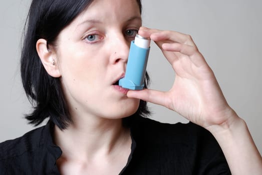 Woman with inhaler