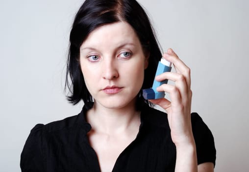 Woman with inhaler