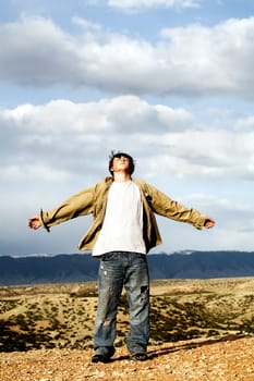freedom - teen with arms with open