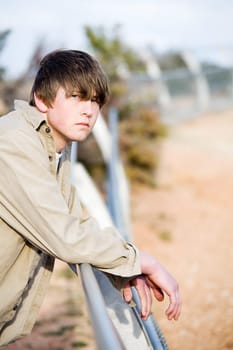 teen on fence portrait