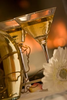 Martini glasses by the fireplace