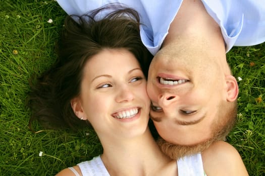 Laughing couple in a meadow