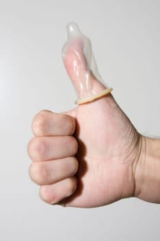 hand holding condom
