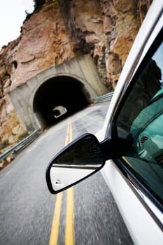 car approaching tunnel