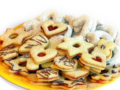 Small  sweets christmas on yellow plate