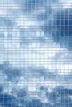 Clouds reflection in office building