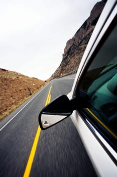 car travel through mountains