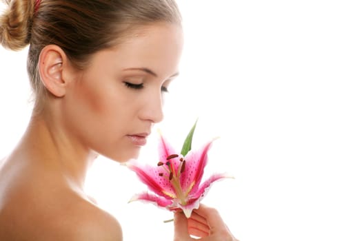 Beauty portrait of a woman with flower