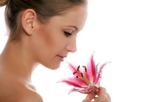 Beauty portrait of a woman with flower