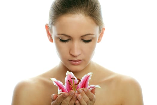 Beauty portrait of a woman with flower