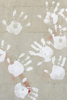 handprints on cement