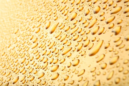 water drops background on gold