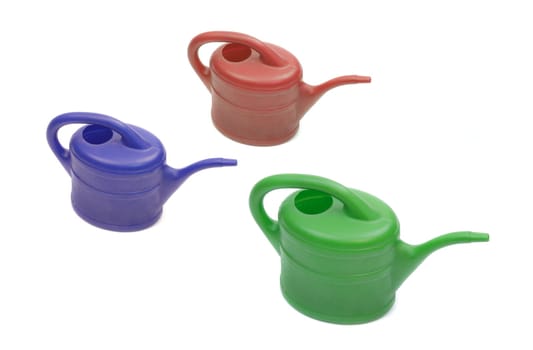 Three watering cans
