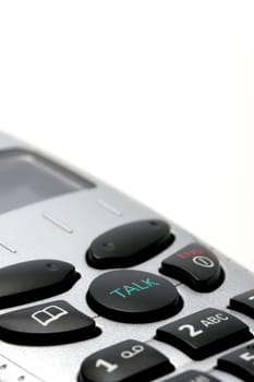 cordless phone handset macro over white