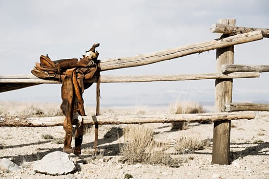ranch - saddle on fence