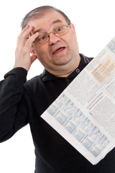 Senior reads newspaper