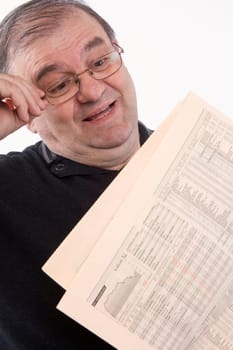 Senior reads newspaper