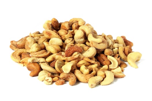 Pile of roasted cashew nuts in isolated