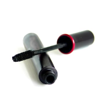 black mascara on white background