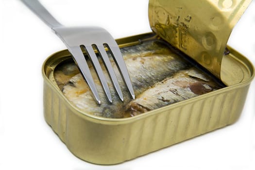 open can of sardines with fork
