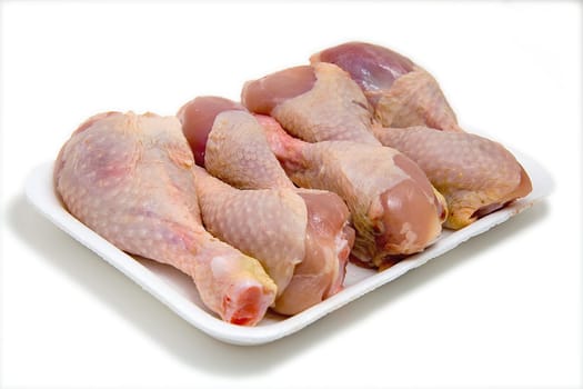 chicken legs on plastic plate