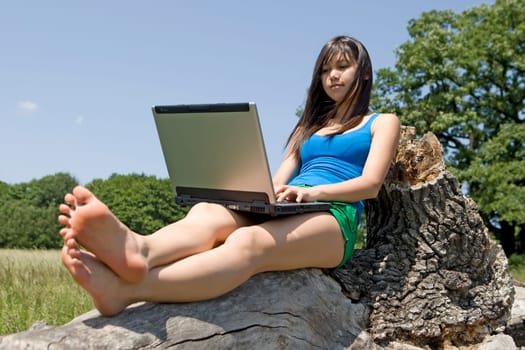Teenage boy with laptop