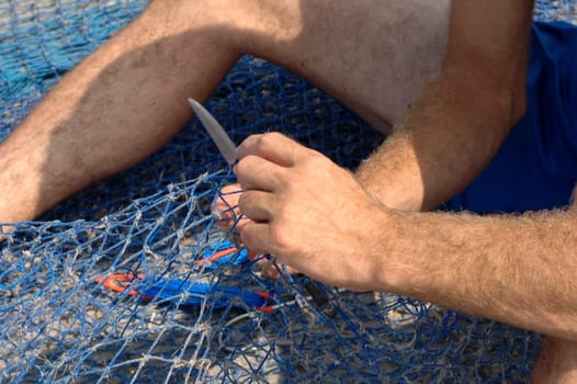 Repairing a fishing net