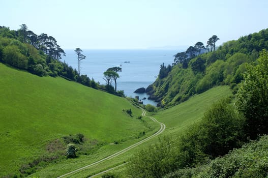 View across Dawn End down to Mill Bay Cove. South of Kingswear,South Devon. UK