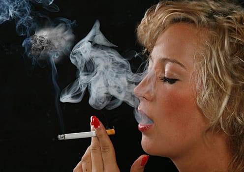 young girl smokes