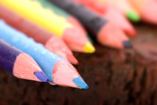 Wet crayons on brick