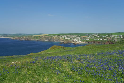 View from Bolt Tail across Hope Cove to the small town of Hope. South Devon,UK