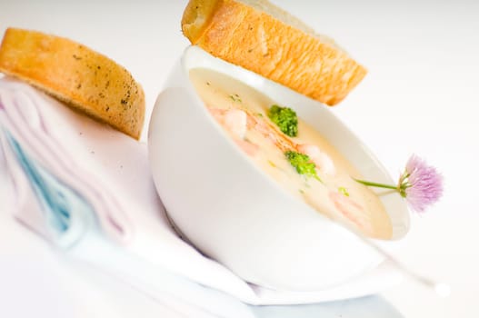 Cream of broccoli soup with prawns