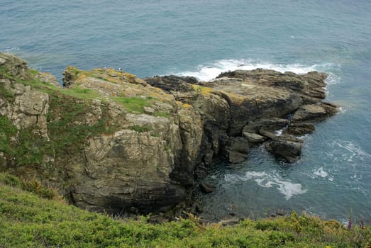 The Bull,a rocky outcrop on the coast at Prawl Point. South Devon,UK